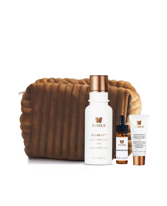 Vivier skincare products including a bottle, tube, and dropper with a brown textured bag on a white background.